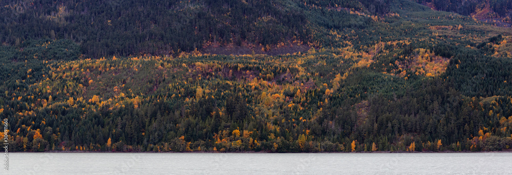 Naklejka premium Beautiful Panoramic Landscape View of Canadian Nature during a Cloudy Autumn Day. Taken at Lillooet Lake, Pemberton, British Columbia, Canada.