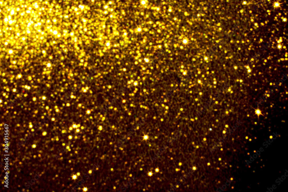 gold Sparkling Lights Festive background with texture. Abstract Christmas twinkled bright bokeh defocused and Falling stars. Winter Card or invitation gold Sparkling Lights Festive background with texture. Abstract Christmas twinkled bright bokeh defocused and Falling stars. Winter Card or invitation