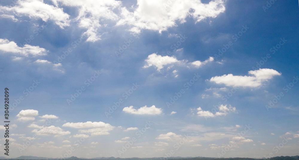 Thin Cloud floating on the blue sky.the sky is bright and clear.. Thin Cloud floating on the blue sky.the sky is bright and clear..