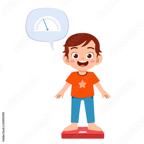 happy cute kid boy use weight scale