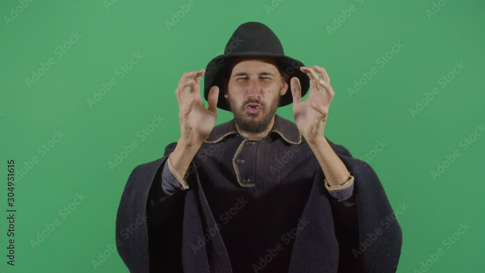 Adult Man Magician Blowing A Spell Adult Man Magician Blowing A Spell