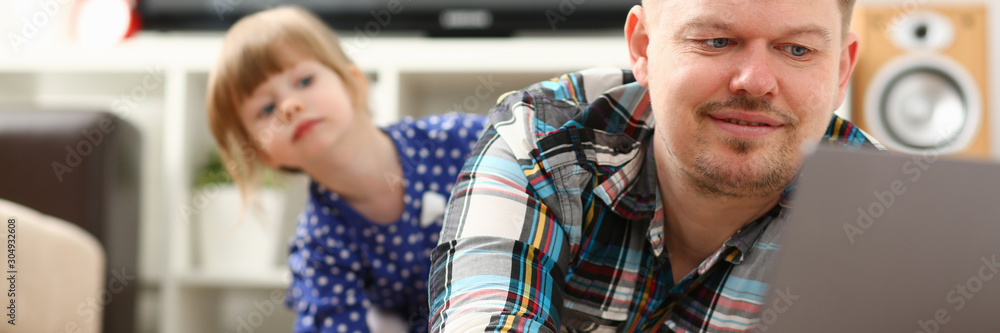 Cute little girl watch out furtively for her dad Cute little girl watch out furtively for her dad