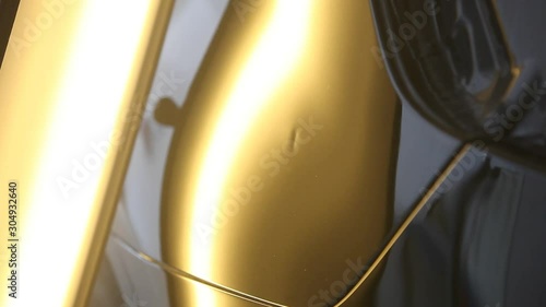 rectification of dents on the metal surface of the car. Metal heating, reflection on the car
