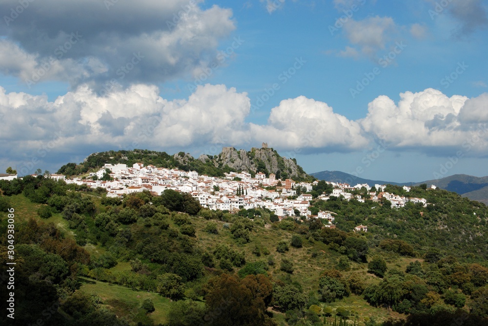 Fototapeta premium View of the white town with the castle and mountains to the rear., Gaucin, Andalusia, Spain.