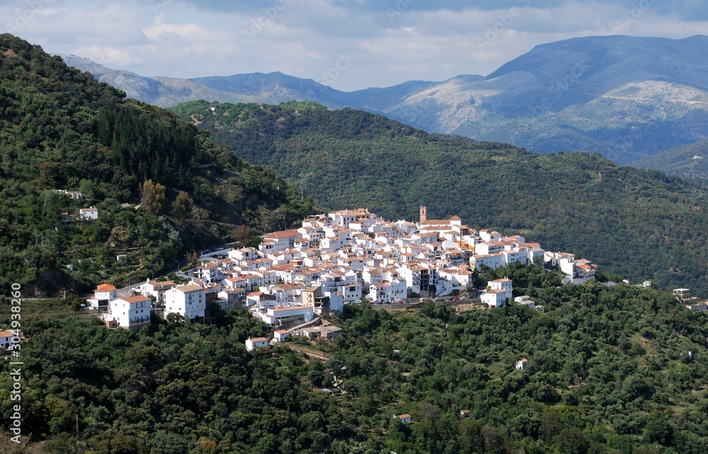 Elevated view of the white town and mountains, Algatocin, Andalusia, Spain.