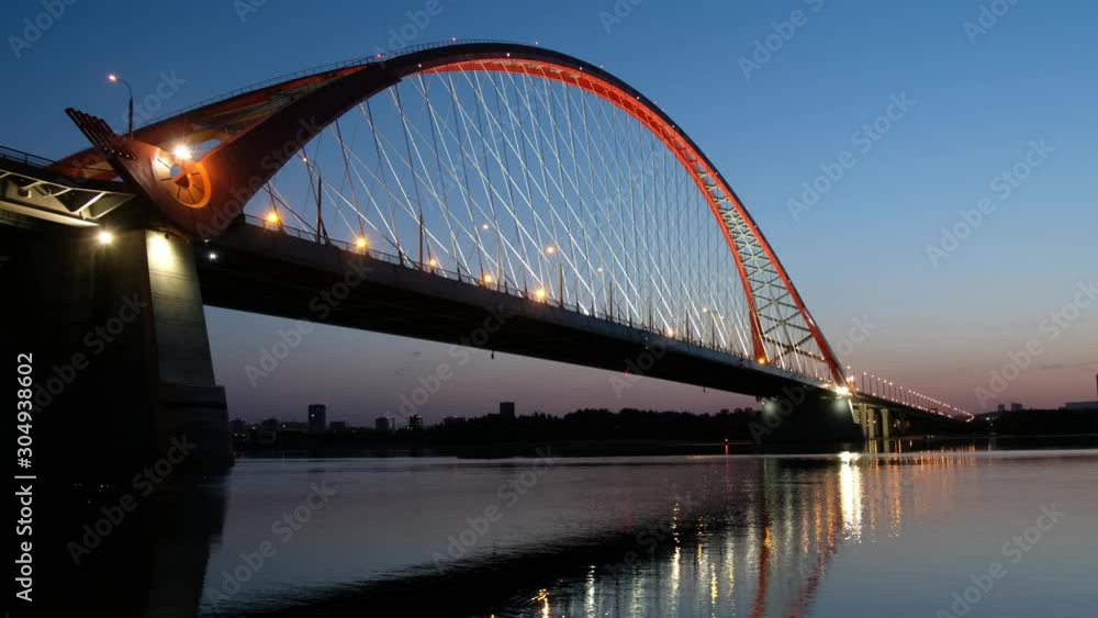 Night video of cable-stayed bridge Bugrinskiy over river Ob in Novosibirsk, Siberia, Russia Night video of cable-stayed bridge Bugrinskiy over river Ob in Novosibirsk, Siberia, Russia
