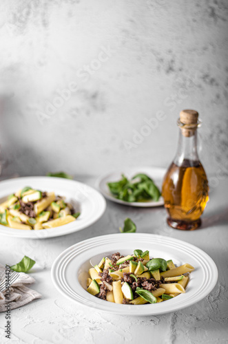 Delicous pasta with beef and fresh avocado