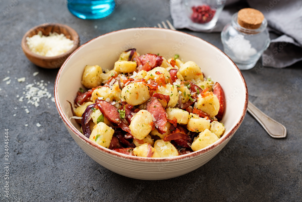 Homemade gnocchi with smoked sausage and bacon. Homemade gnocchi with smoked sausage and bacon.