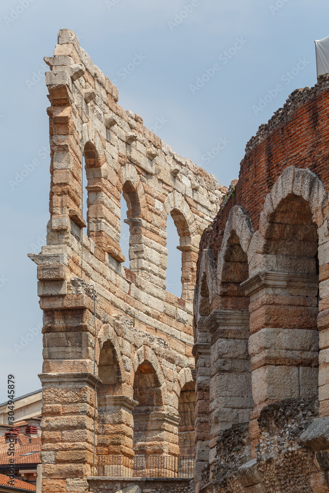 View to ancient Roman amphitheatre converted into arena in the centre of Verona, Italy