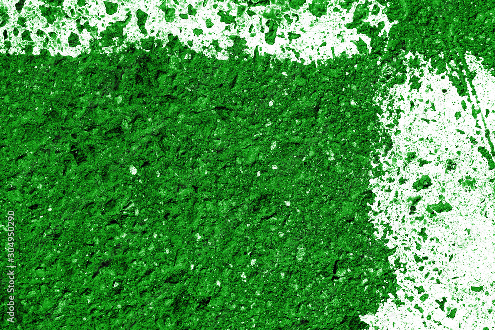 Old asphalt surface with white paint close-up, top view. Abstract background. Green color toned Old asphalt surface with white paint close-up, top view. Abstract background. Green color toned