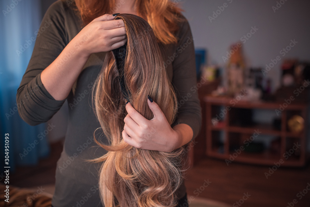 Fototapeta premium Wigs, hair. Womens beauty concept