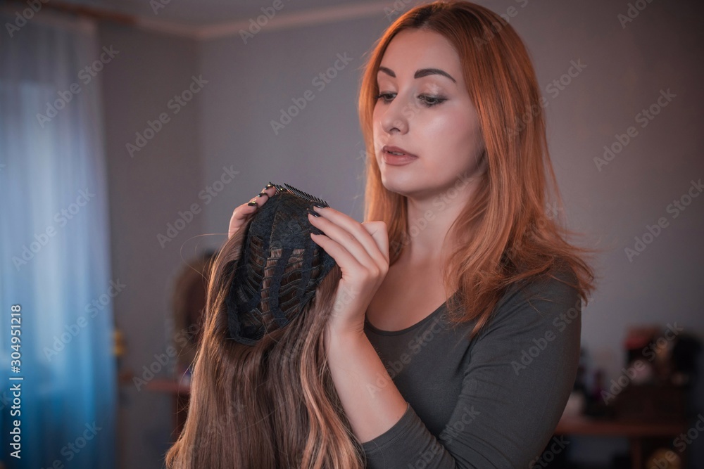 Fototapeta premium Wigs, hair. Womens beauty concept