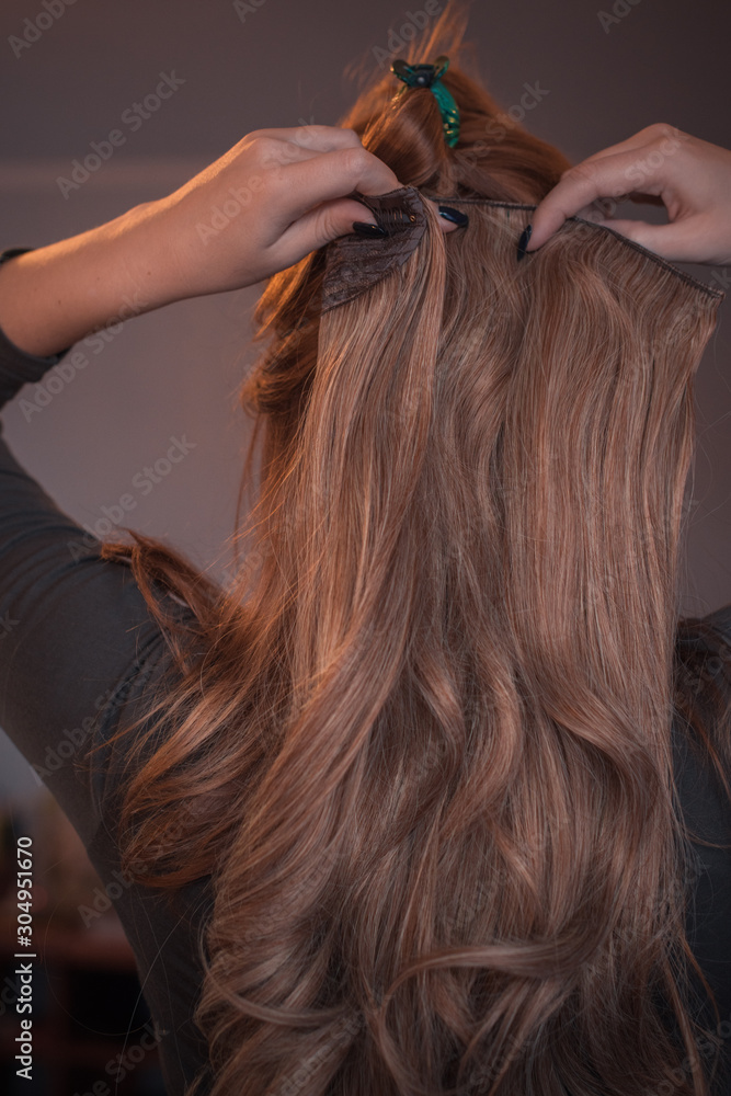 Fototapeta premium Wigs, hair. Womens beauty concept