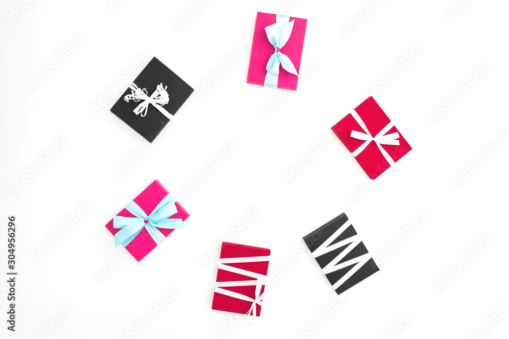 Obraz premium Christmas frame of gifts on white background. Winter concept. Flat lay