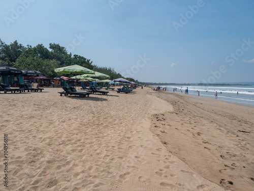 BALI - November 2019  Located on the western side of the island s narrow isthmus  Kuta Beach is Bali s most famous beach resort destination. Autumn in Bali  Indonesia