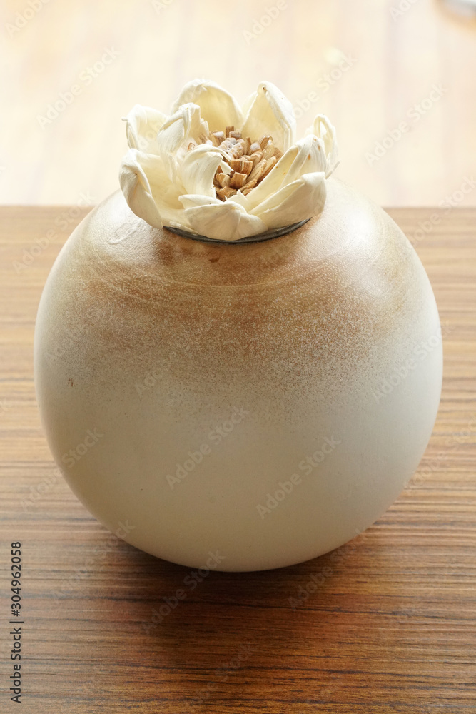 Jasmine Flowers made of wood On a round vase - interior decorate Jasmine Flowers made of wood On a round vase - interior decorate