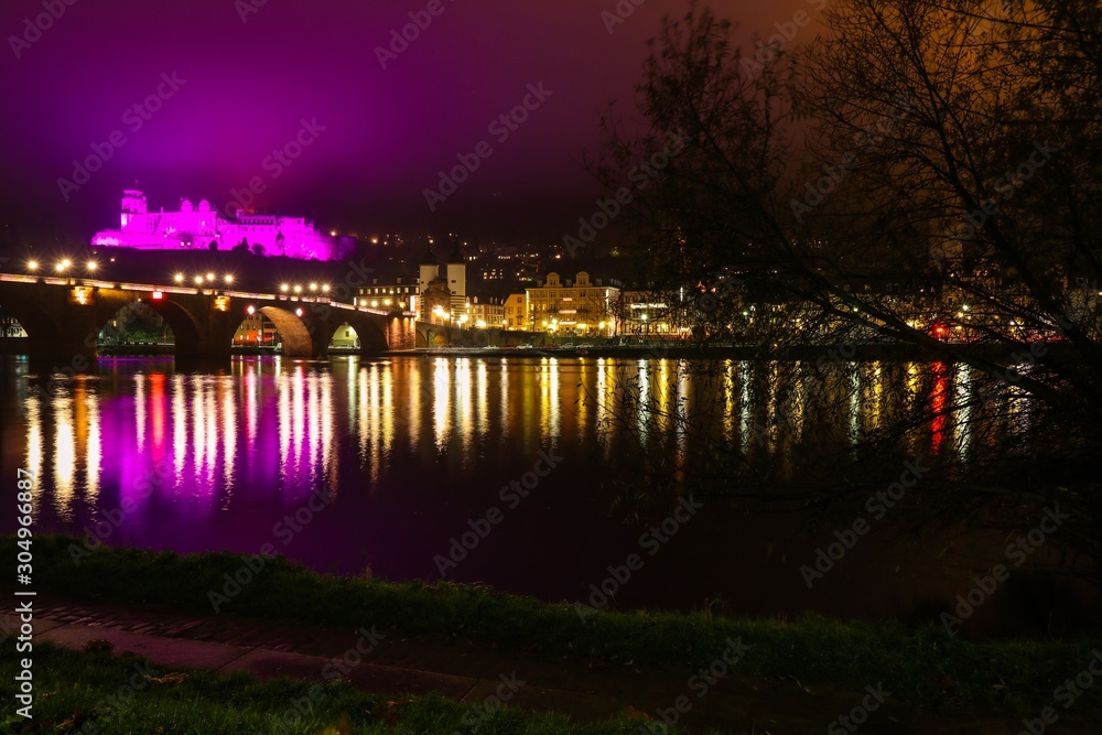 The old castle is highlighted in purple. Night landscape. The old castle is highlighted in purple. Night landscape.