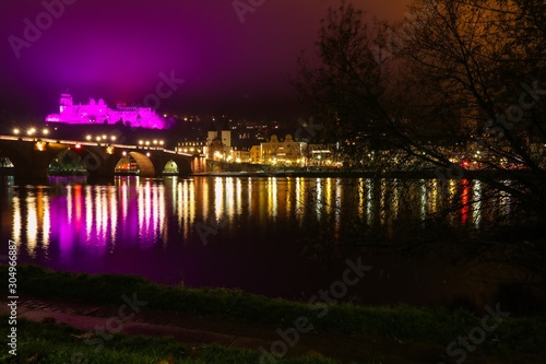 The old castle is highlighted in purple. Night landscape.