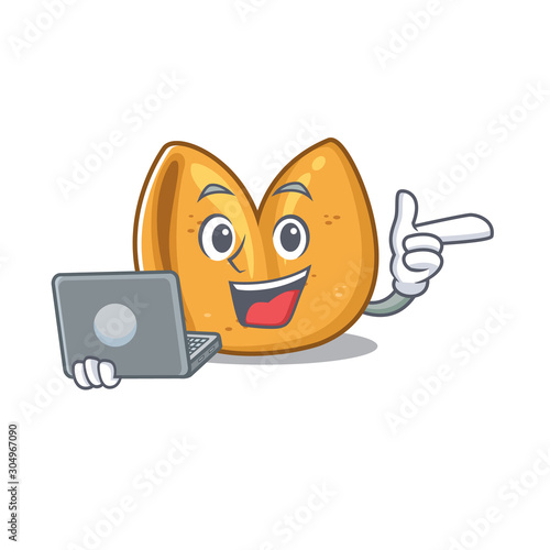 Happy smiling fortune cookie cartoon character working With laptop