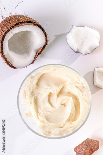 Coconut sweet cream. Sweet cream in glass bowl. Confectionery, sweet life, calories.