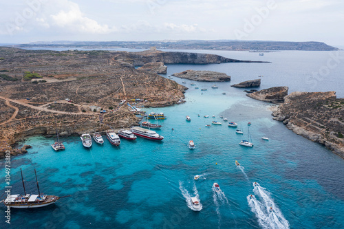 Aerial drone shot of Blue lagoon Gozo Malta Comino island. Best beaches of Mediterranean