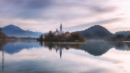 Mourning view of Lake Bled with a purple cloudy sky, Slovenia