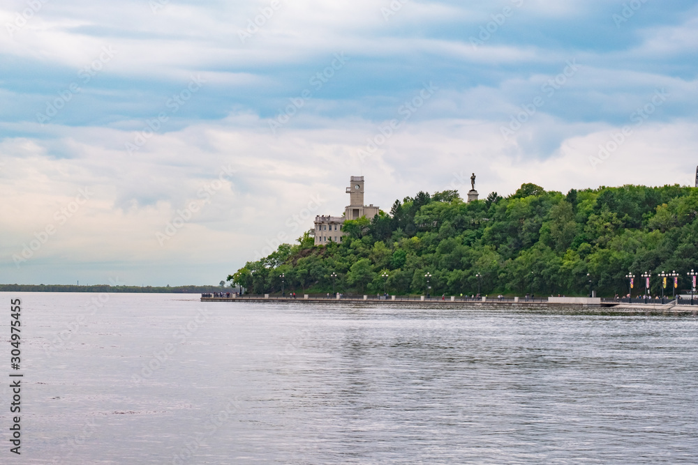 Fototapeta premium Khabarovsk, Russia - Aug 21, 2019: Flood on the Amur river near the city of Khabarovsk. The level of the Amur river at around 601 centimeters.