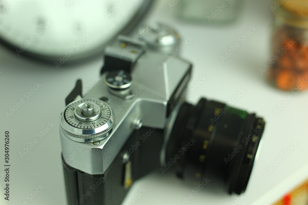 old movie camera on white background old movie camera on white background