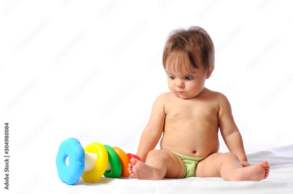 Happy child plays with toy Happy child plays with toy