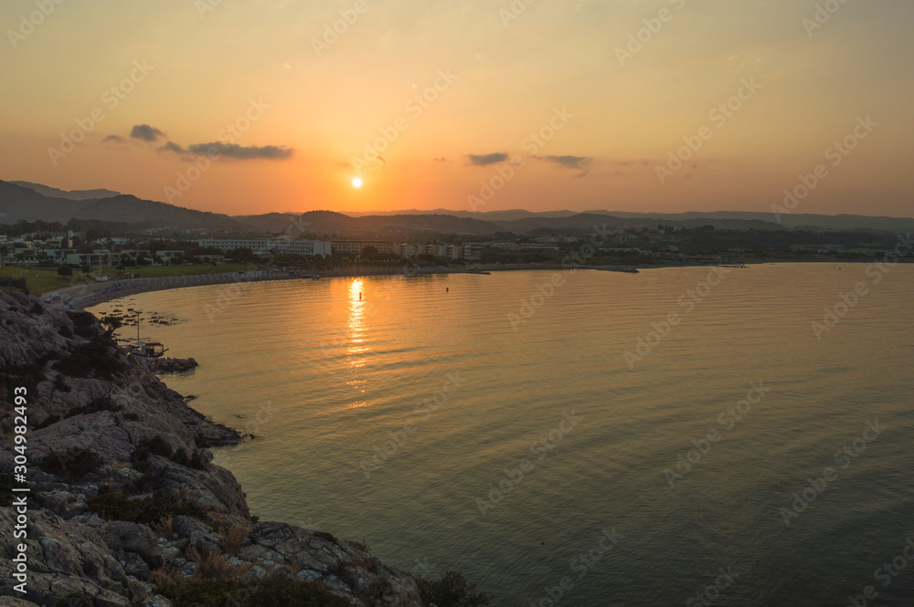 The sun setting over Kolymbia bay in Rhodes