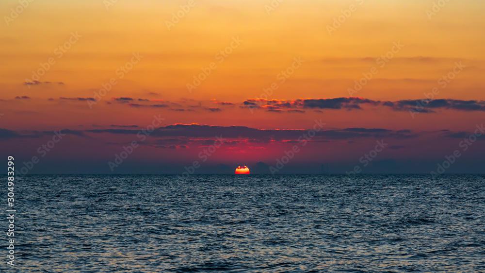 Bright colorful sunrise on the sea Bright colorful sunrise on the sea