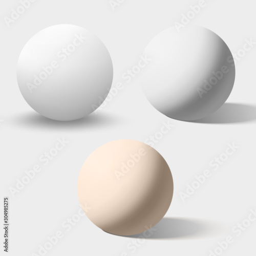 White and cream realistic spheres isolated on white