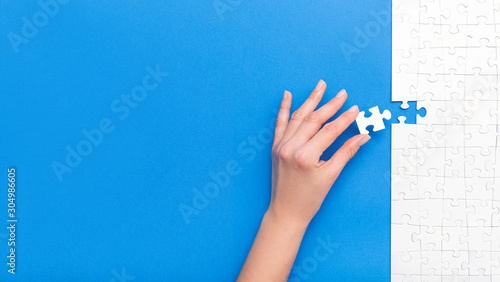 Business concept of white jigsaw puzzle. photo