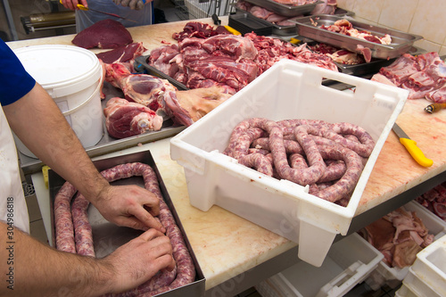production of sausage in the meat shop