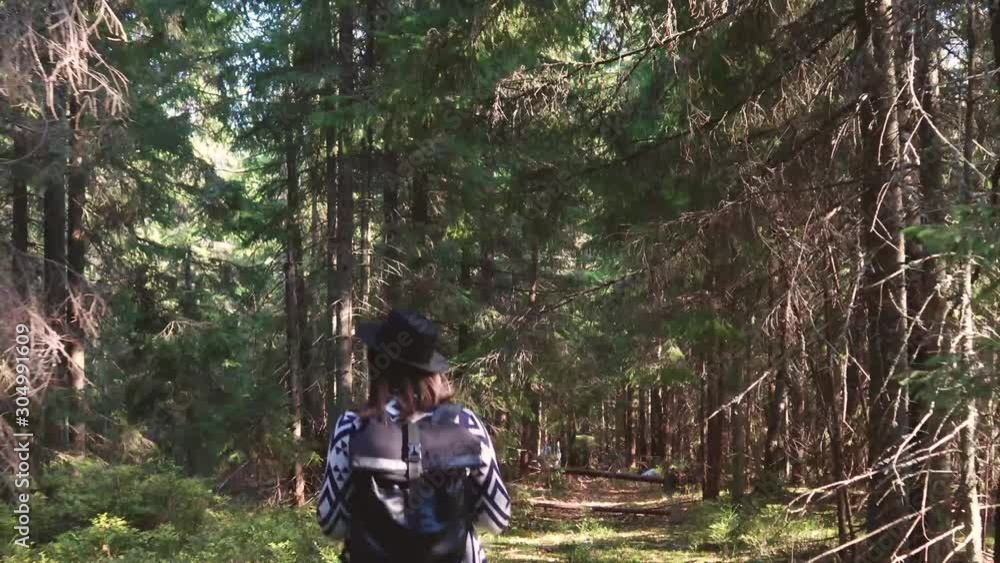 Romantic couple walking in the forest. Travels in autumn. Ukrainian Carpathians Romantic couple walking in the forest. Travels in autumn. Ukrainian Carpathians