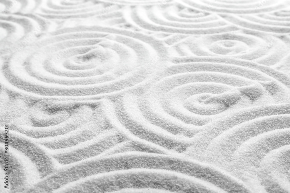 Fototapeta White sand with pattern as background. Zen, meditation, harmony