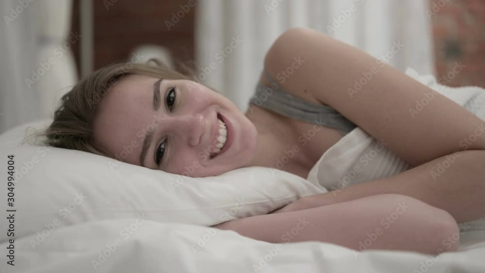 Close up of Talking Young Woman Chatting in Bed Close up of Talking Young Woman Chatting in Bed