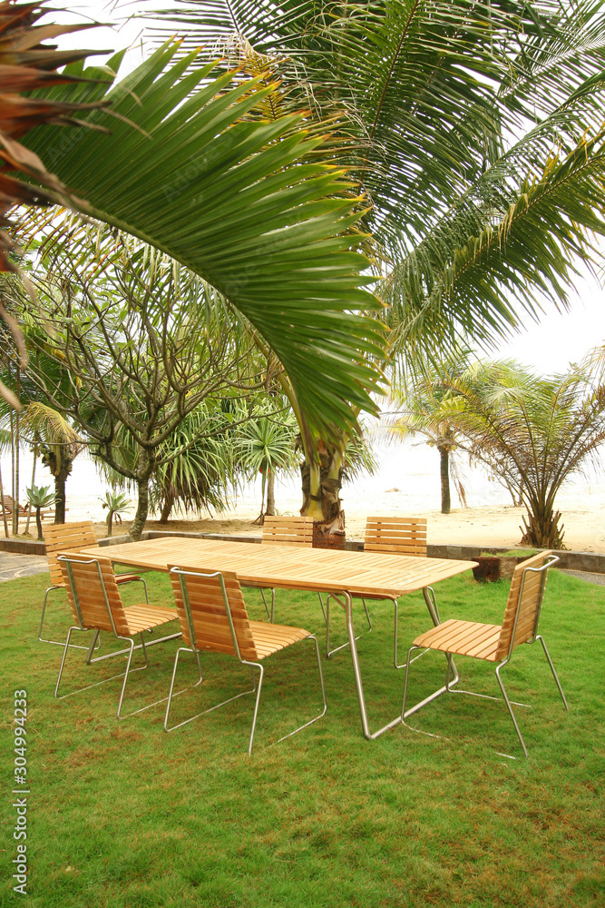Fototapeta premium Artistic Ethnic Classy Modern Elegant Luxury Indoor Home Interiors and Outdoor Garden Park Furniture Table Chair Cabinet Accessories from Rattan Plastic Wicker or Wooden Materials for Hotel and House 