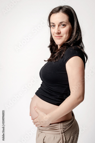 Pregnant woman in white background