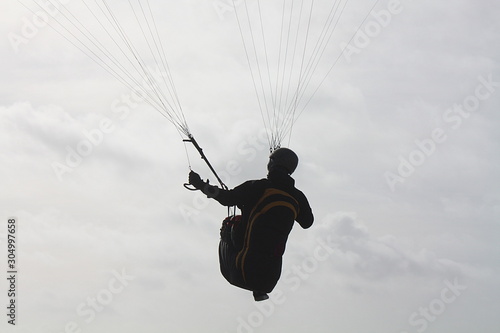 Bild auf Leinwand Pilot von einem Paraglider