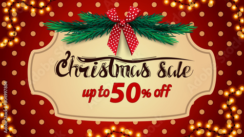 Christmas sale, up to 50% off, red discount banner with polka dot texture, vintage frame, christmas tree and red bow