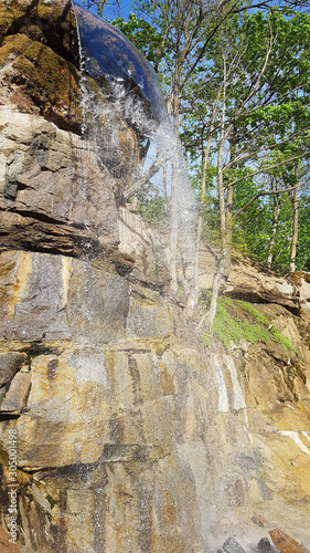 Waterfall in the rock of the dendrological park Sofiyivka