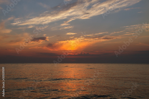 Colorful orange sunset on the sea © Natalya