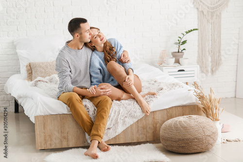 Beautiful young sitting on ...