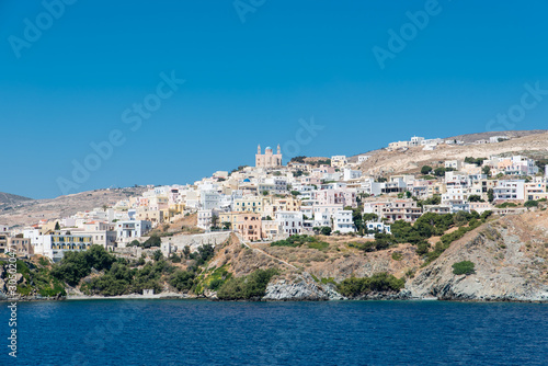 Fototapeta Naklejka Na Ścianę i Meble -  Syros island as seen when entering the port from the ship, Cyclades, Greece