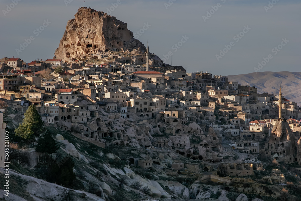 The village of Uchisar. Last sunny rays. Cappadocia, Turkey.