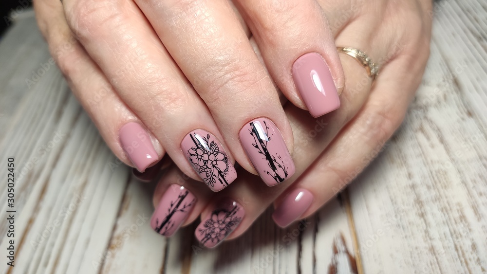 Trendy manicure design on a beautiful background. Trendy manicure design on a beautiful background.