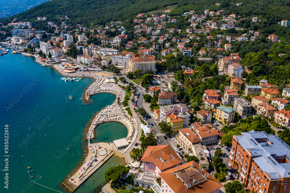 Aerial panoramic view of beautiful Town of Opatija and Lungomare sea walkway, Kvarner bay of Croatia
