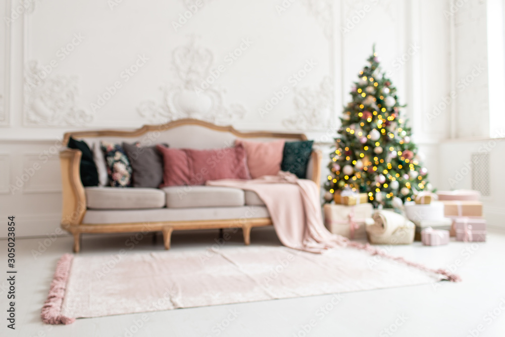 Blurred photo of modern living room with Christmas tree and sofa inside Blurred photo of modern living room with Christmas tree and sofa inside