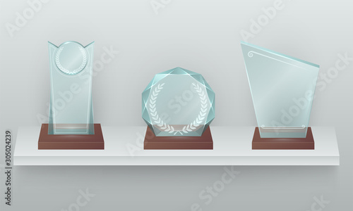 Three crystal awards on shelf realistic illustration